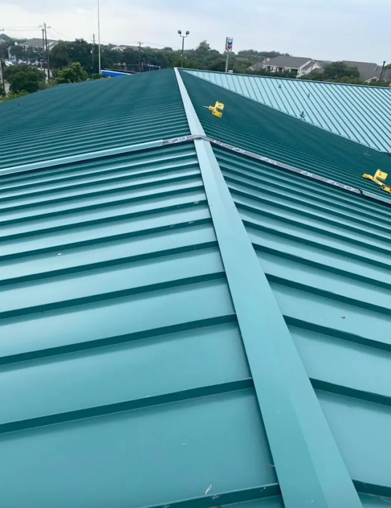 Green commercial metal roof ridge and valley for Metal Roof Repair in Fort Leonard Wood